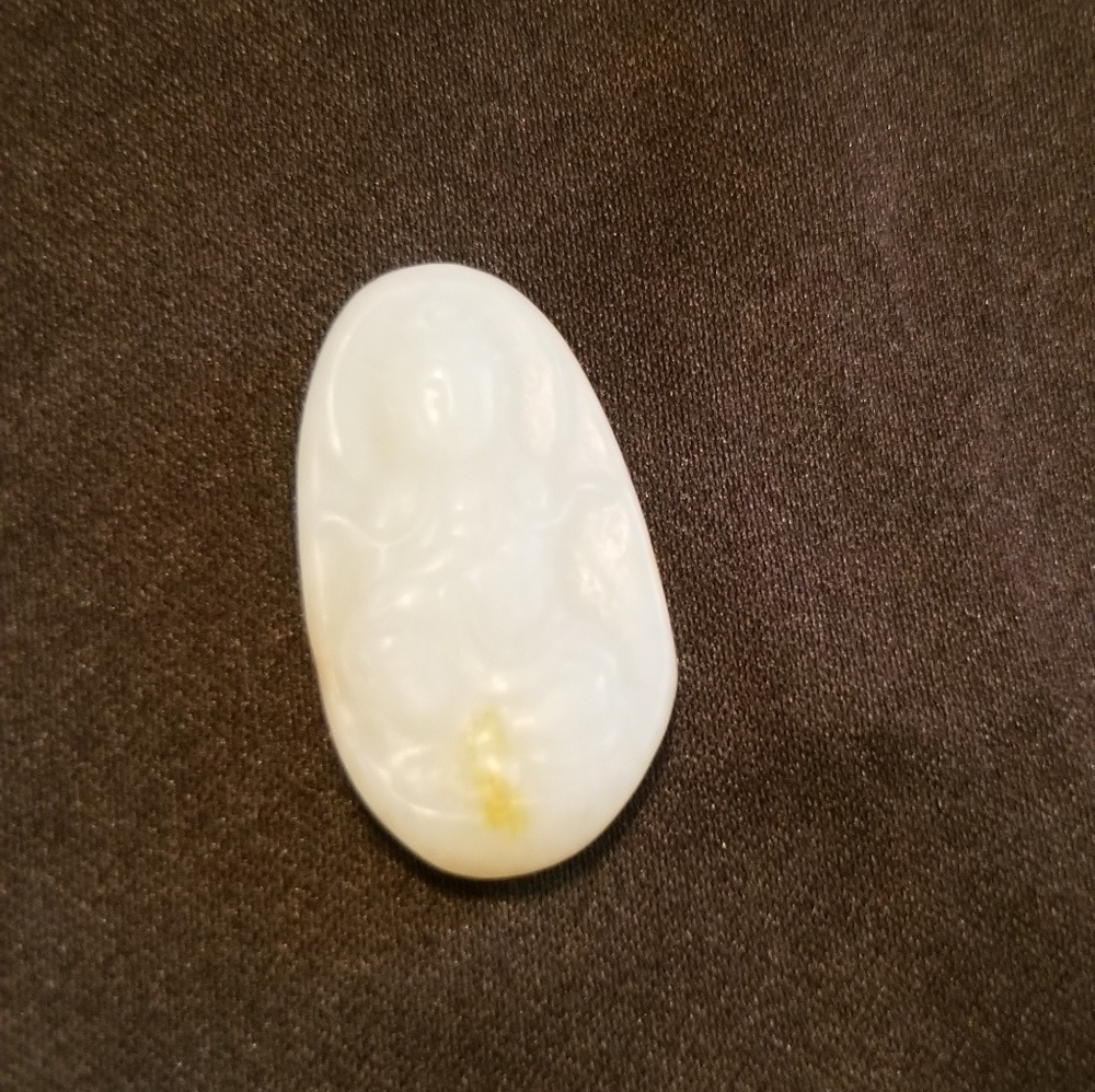 Hand carved jade pendant